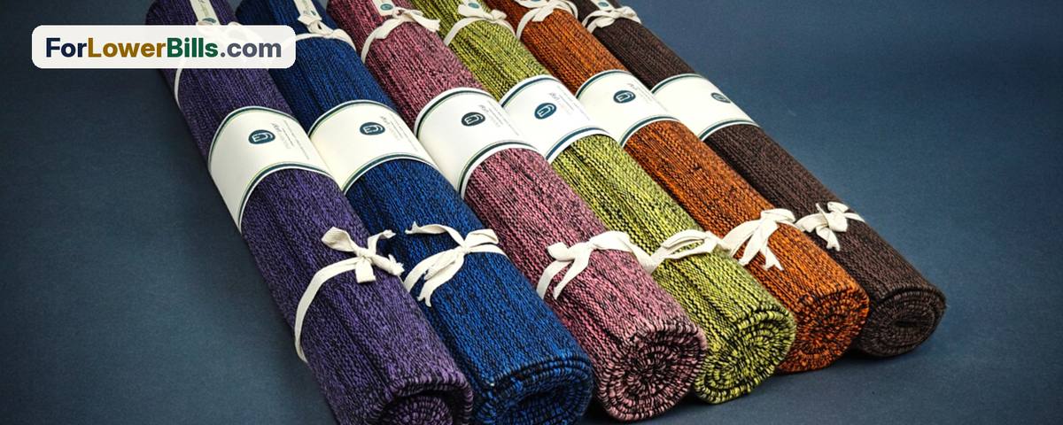 Rolled-up yoga mats in a row