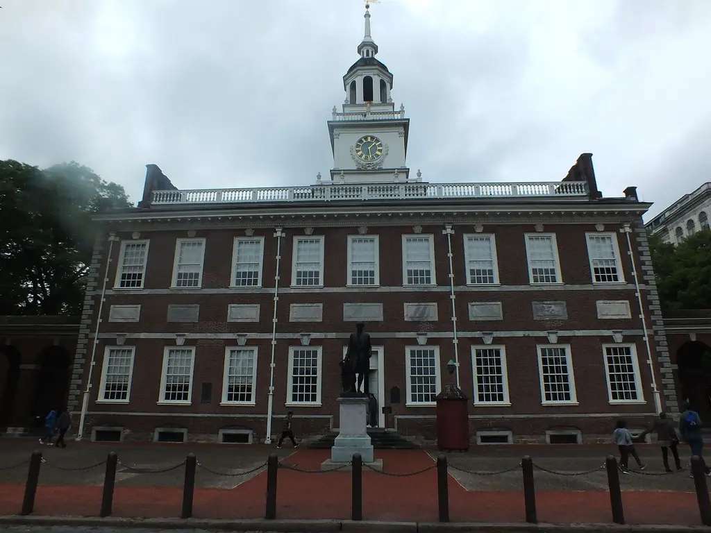 Red-brick Independence Hall in Philadelphia with its white clock tower and steeple