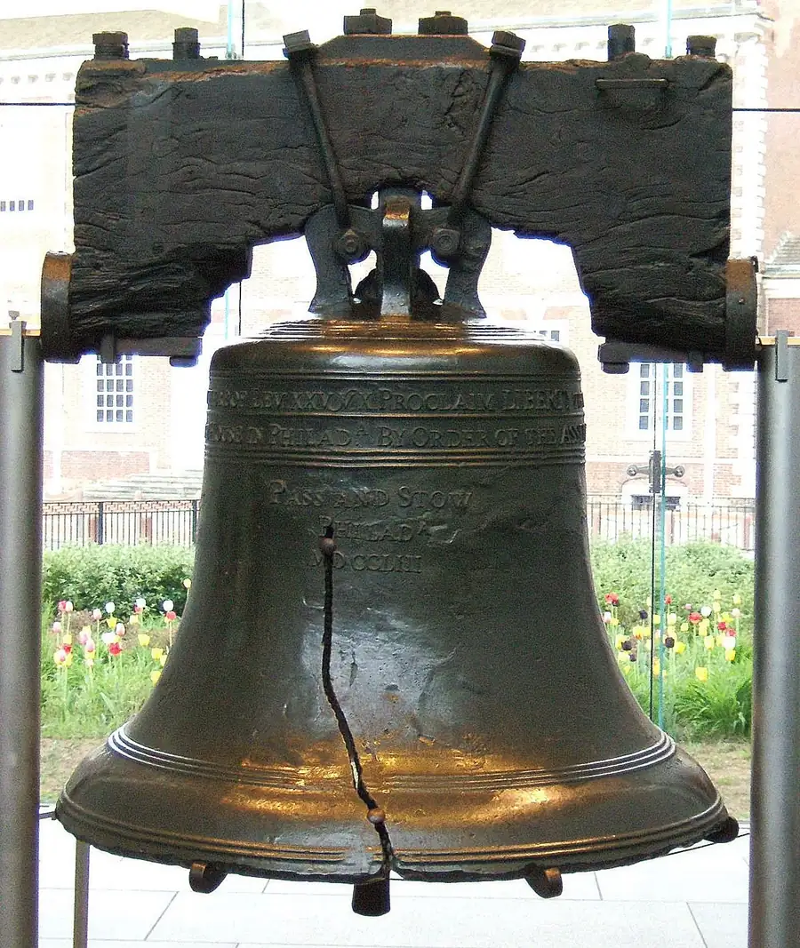 Close-up of the Liberty Bell showing its famous crack and wooden yoke